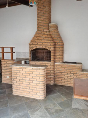 Casa na praia de Peruíbe com piscina/churrasqueira em condomínio fechado!